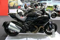 The Ducati Diavel at the 33rd Bangkok International Motorshow. More information about the Ducati Diavel can be found here: [story:Ducati-Diavel-and-Yamaha-VMAX-compared The Ducati Diavel and Yamaha VMAX compared].